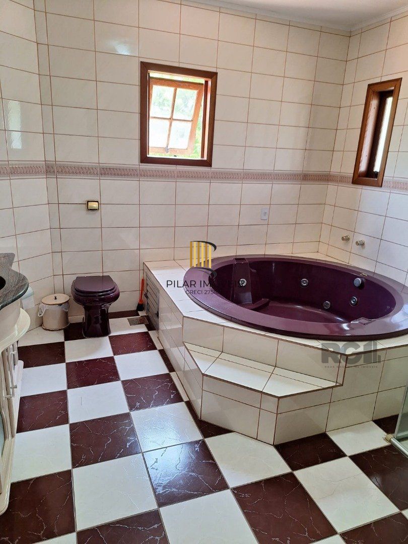 Casa 3 dormitórios no bairro Jardim Algarve