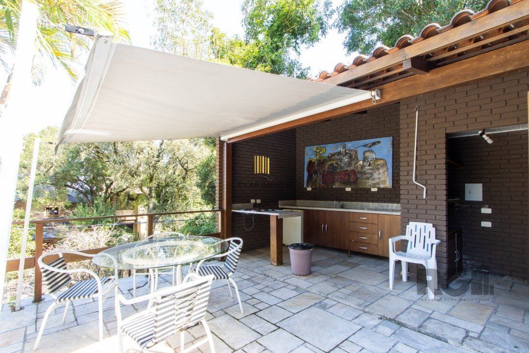 Casa deslumbrante vista do Guaiba, 3 dormitórios, sendo 1 suite master com closet e banheira de hidro com vista para o rio