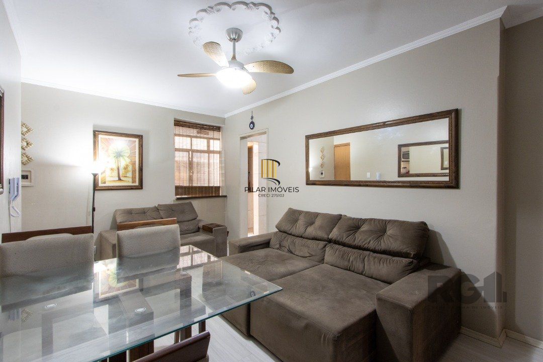 Apartamento com 70m² de área privativa, possui 3 dormitórios, sala para 2 ambientes, banheiro social, cozinha com móveis planejados e área de serviço. - Pilar Imóveis