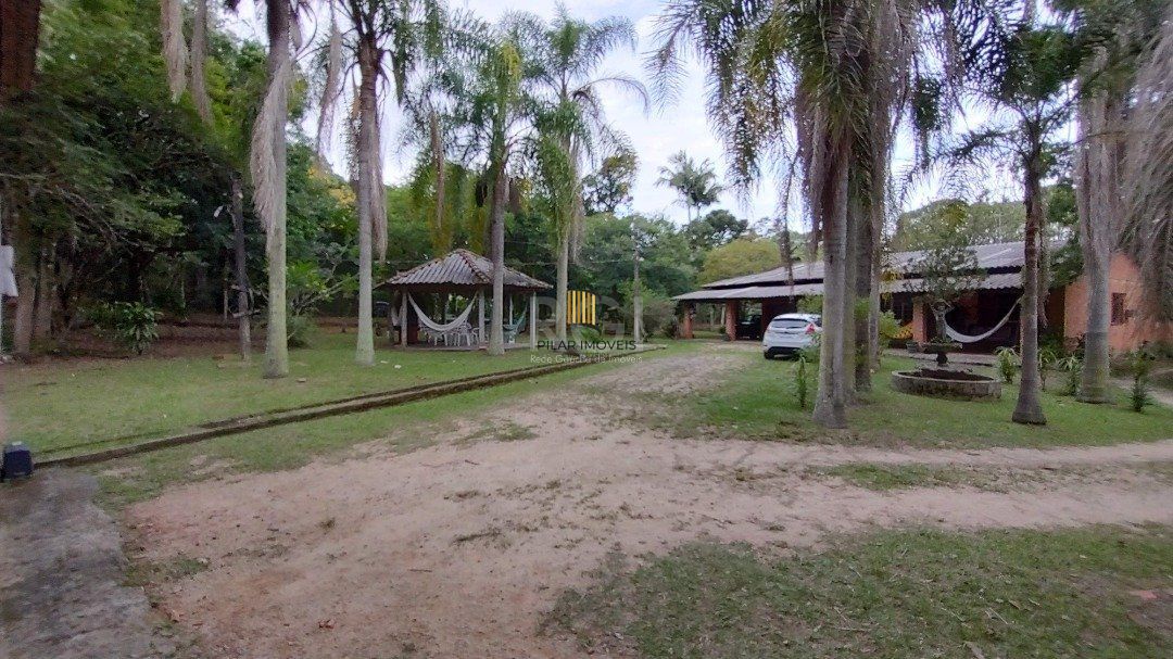 Sitio à venda no Lami, com 2 casas térreas, com 4 quartos cada uma - Pilar Imóveis