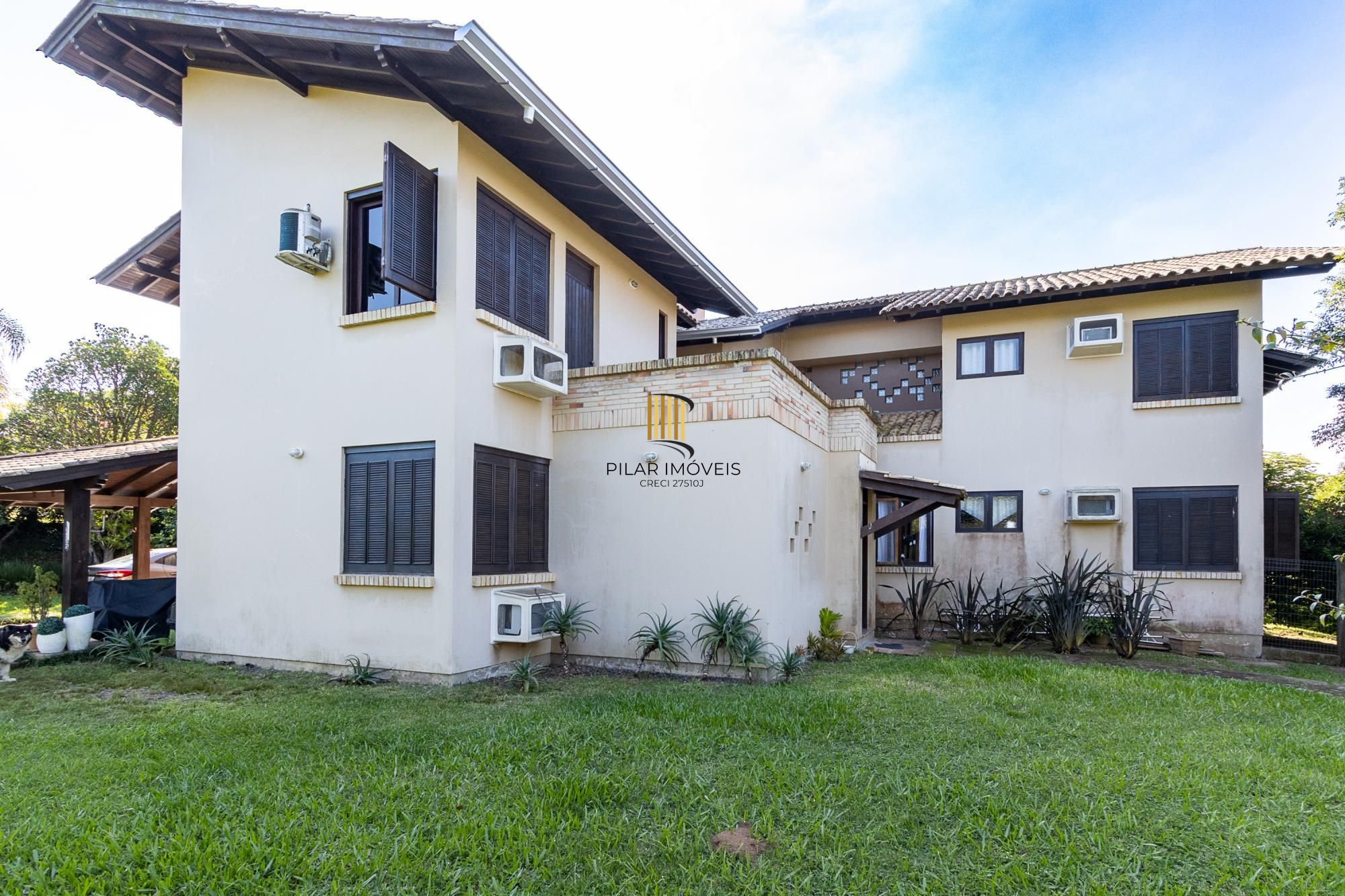 Casa em condomínio á venda com 6 dormitórios em Porto Alegre