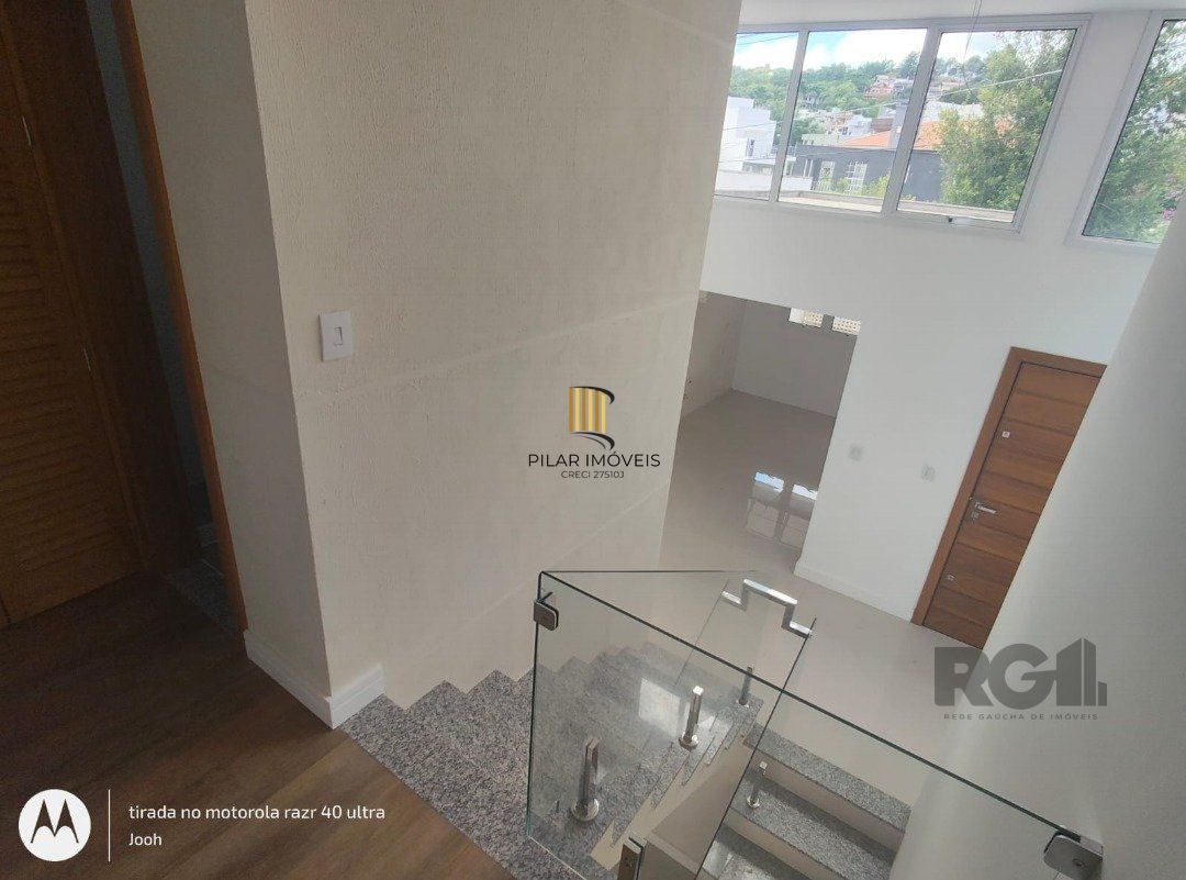 Casa em Condomínio fechado com 3 dormitórios no bairro Vila Nova em Porto Alegre, RS