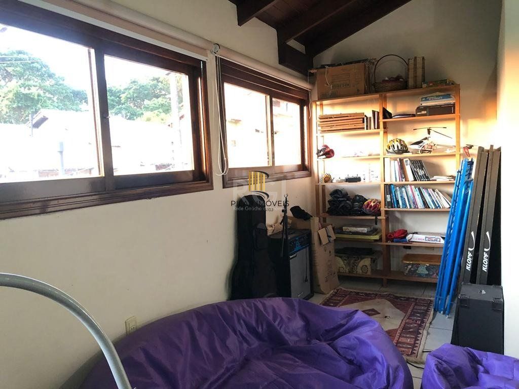 Casa de Condomínio 4 dormitórios no bairro Cavalhada