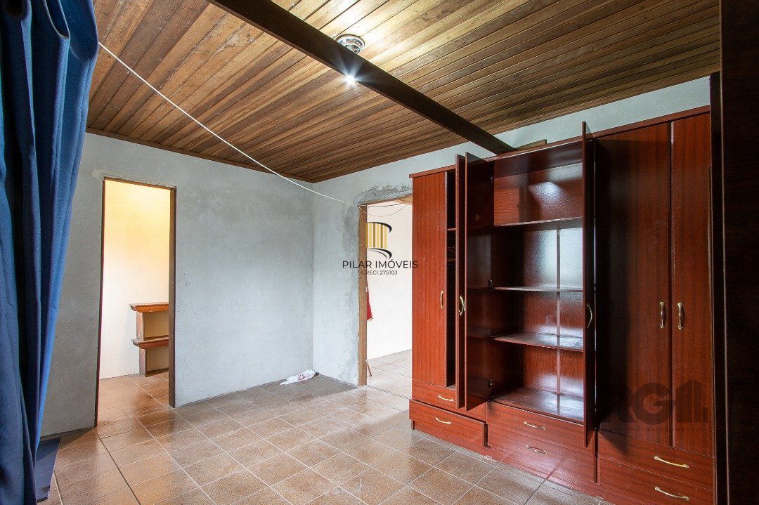 Casa 5 dormitórios no bairro Ipanema