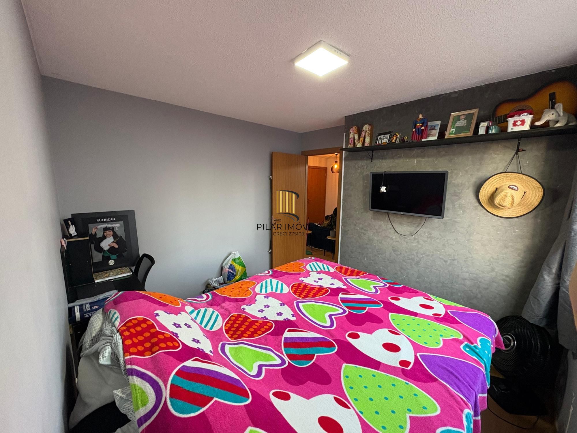 Apartamento em Viamão 2 dormitórios, sala de estar e jantar integradas à cozinha, banheiro social e vaga de garagem privativa.