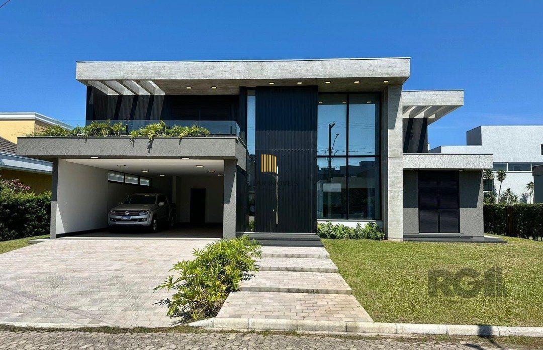 Casa de Condomínio 4 dormitórios no bairro Atlântida