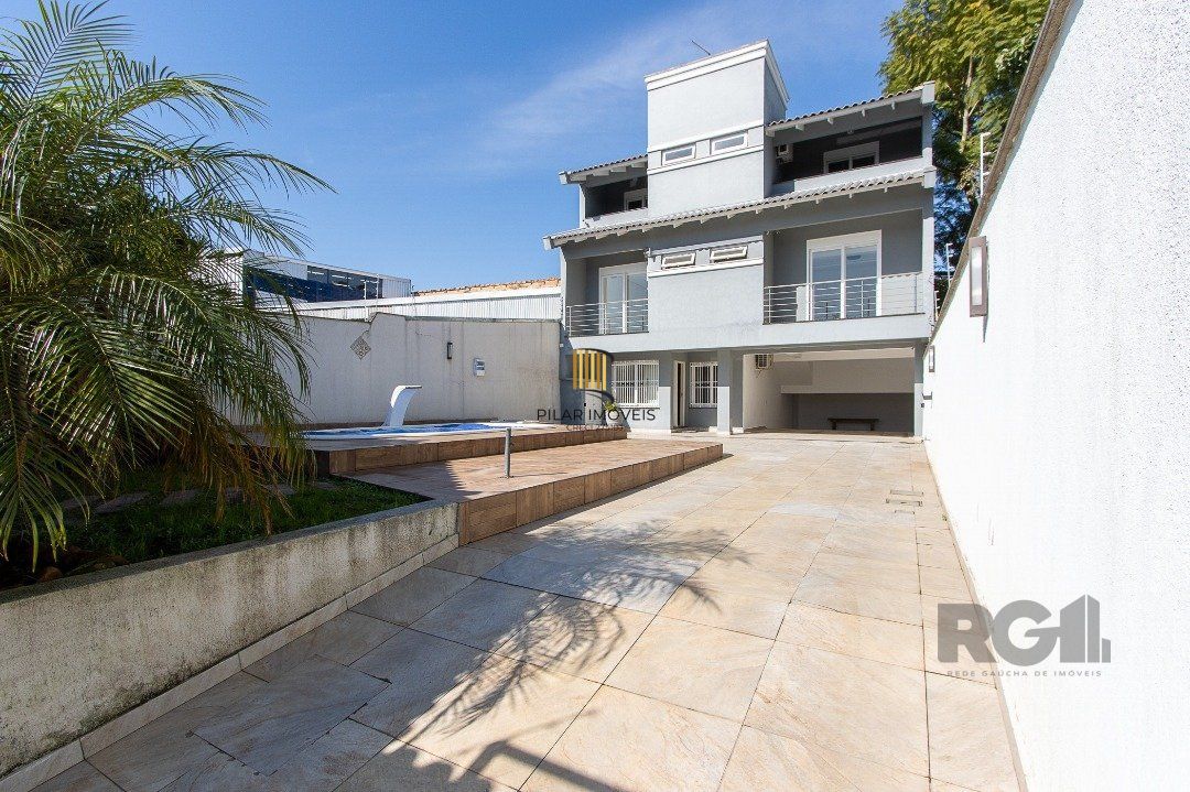 Casa 4 dormitórios no bairro Nonoai - Pilar Imóveis