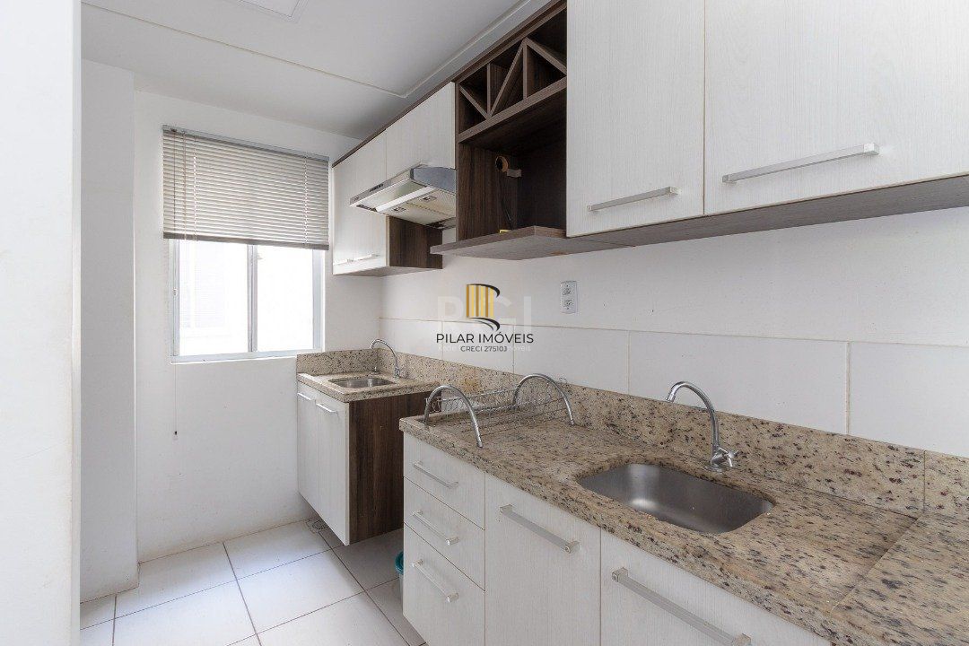 Apartamento 2 dormitórios , sala com dois ambientes , cozinha americana sacada com churrasqueira 1 vaga