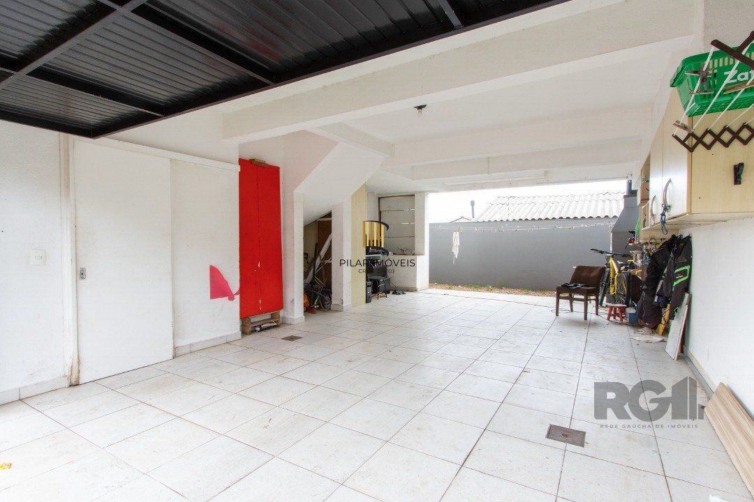 Casa 3 dormitórios no bairro Camaquã