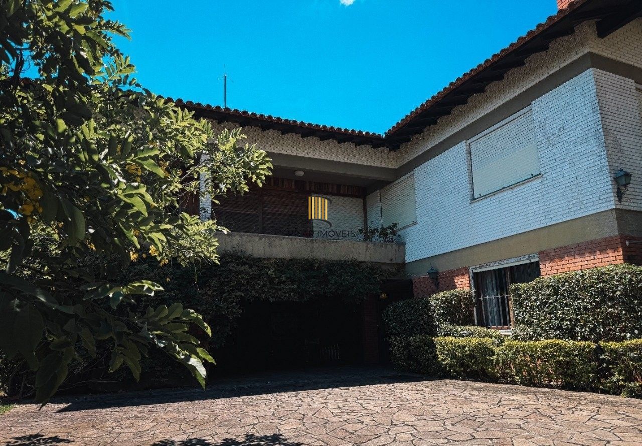 Casa bairro Sétimo Céu, 463m² privativos, vista privilegiada do Rio Guaíba em terreno de 1.423m².