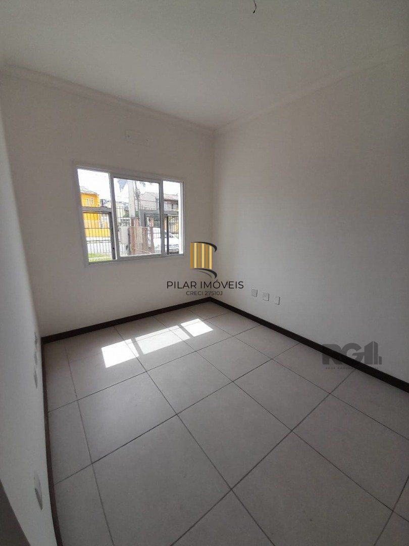 Casa 3 dormitórios no bairro Camaquã