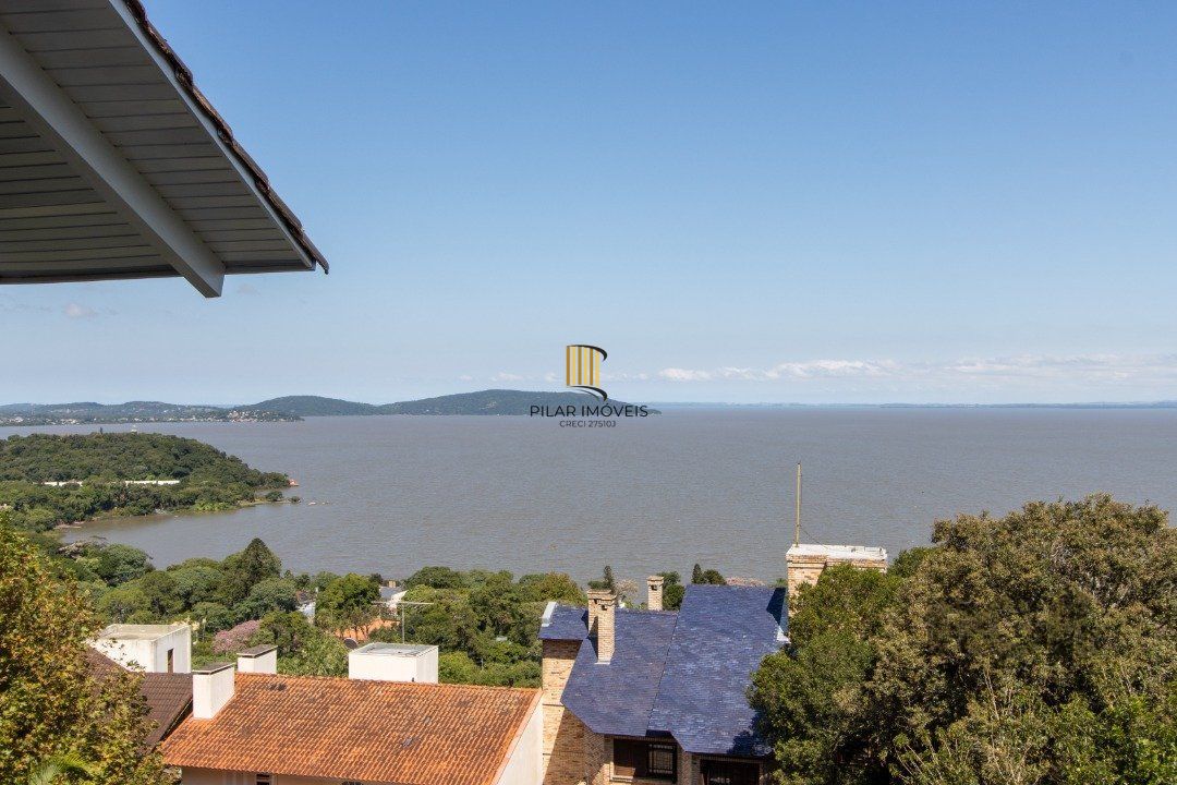 Casa deslumbrante vista do Guaiba, 3 dormitórios, sendo 1 suite master com closet e banheira de hidro com vista para o rio - Pilar Imóveis