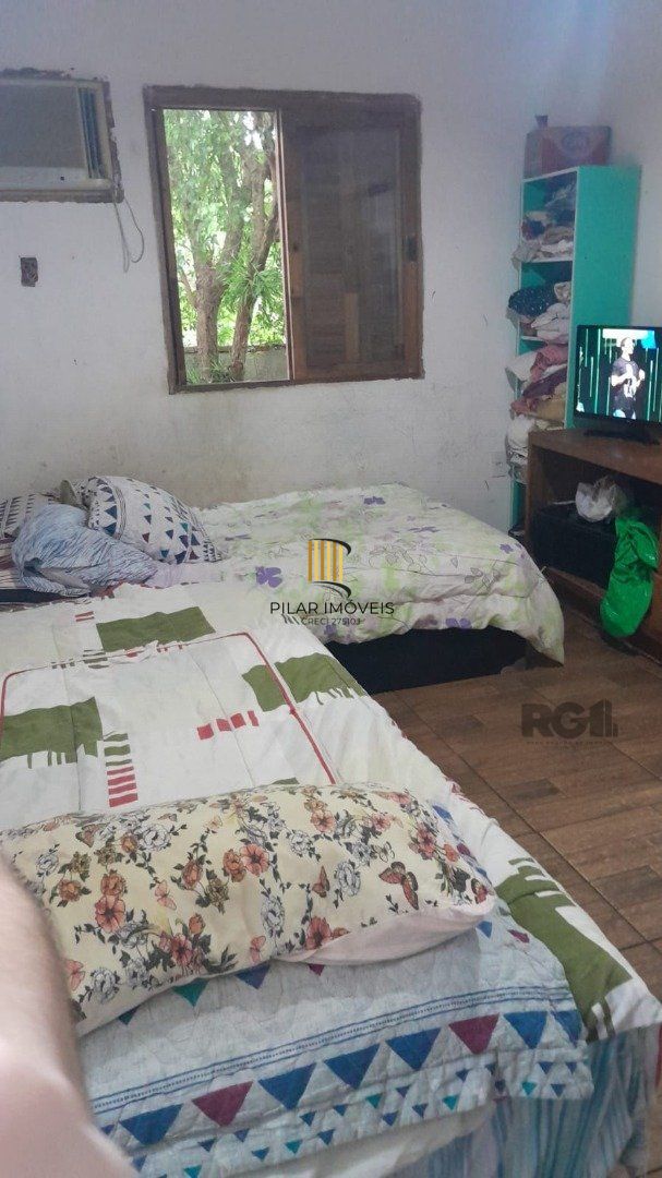 Casa 6 dormitórios no bairro Ponta Grossa