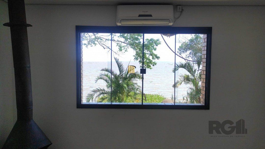 AMPLA CASA COM PRAIA PRIVATIVA NA ZONA SUL DE POA