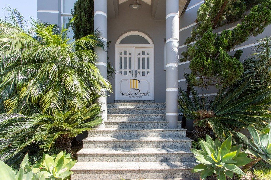 Casa de Condomínio 4 dormitórios no bairro Nonoai