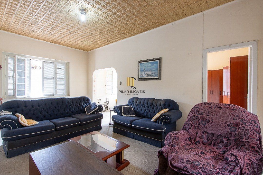 Casa 5 dormitórios no bairro Ipanema