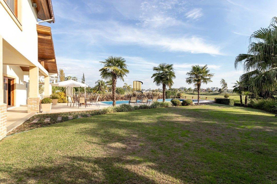 Casa Condominio para Venda - 670m², 5 dormitórios, sendo 5 suites, 4 vagas - Terra Ville