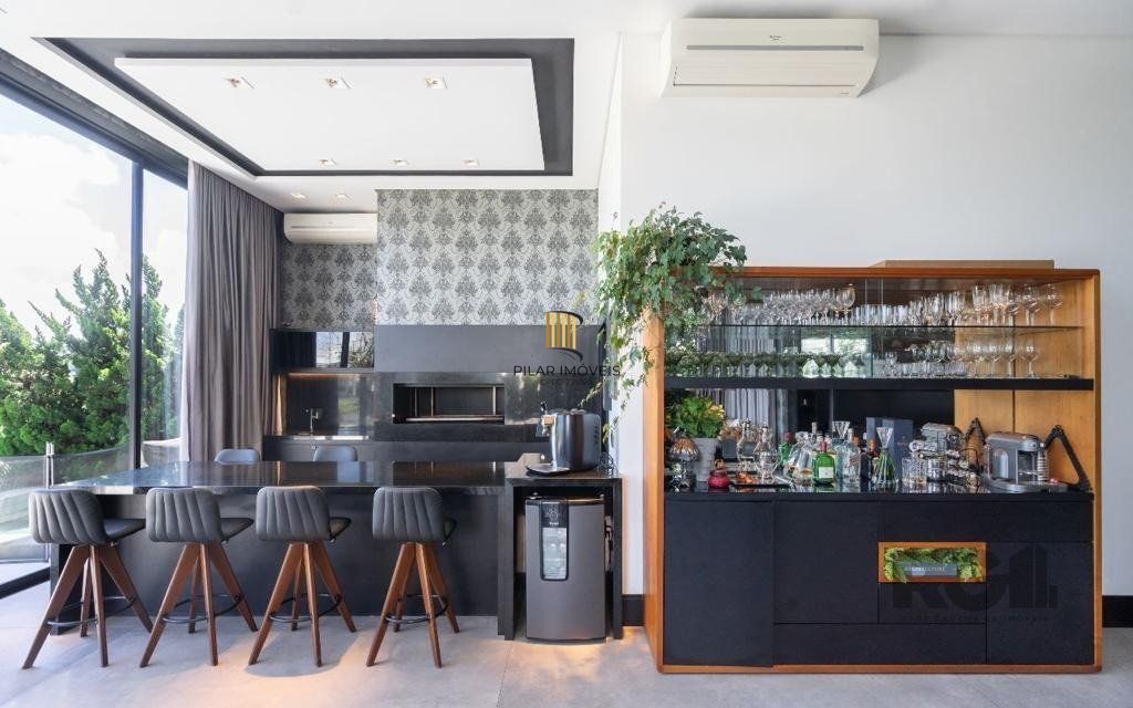 Casa de Condomínio 6 dormitórios no bairro Atlântida Sul