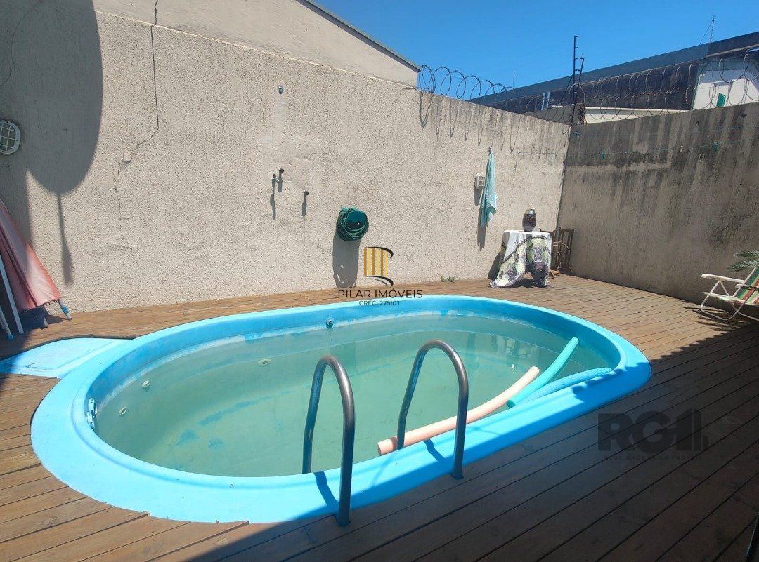 Casa de Condomínio 3 dormitórios no bairro Cavalhada
