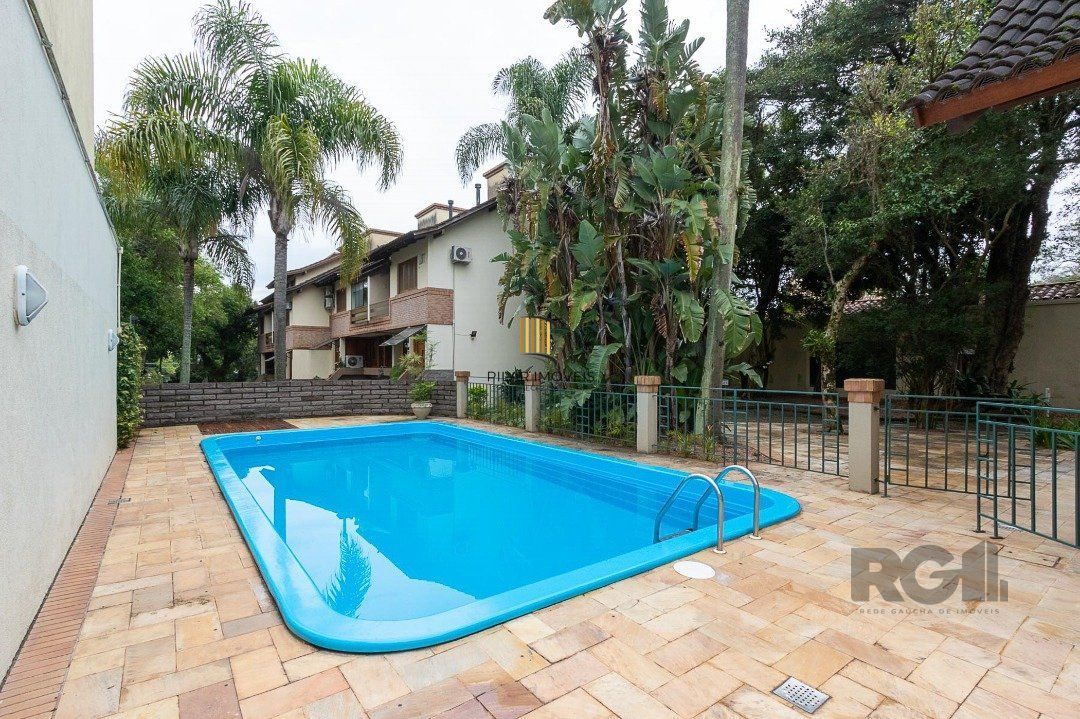 Casa de Condomínio 4 dormitórios no bairro Tristeza