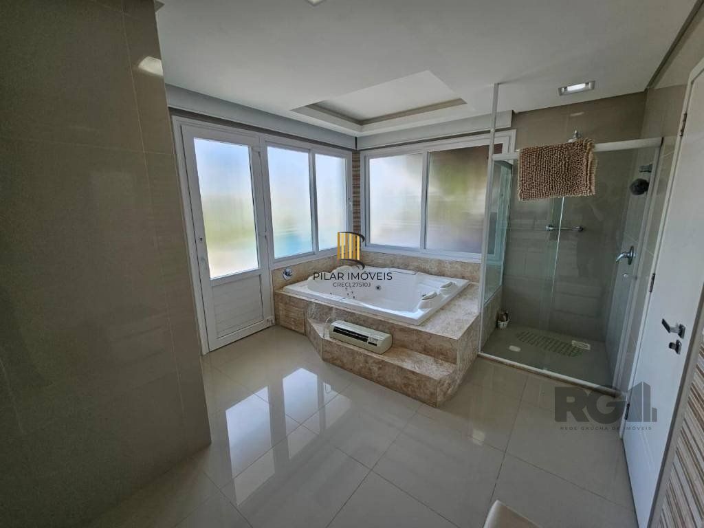 Casa de Condomínio 4 dormitórios no bairro Atlântida Sul