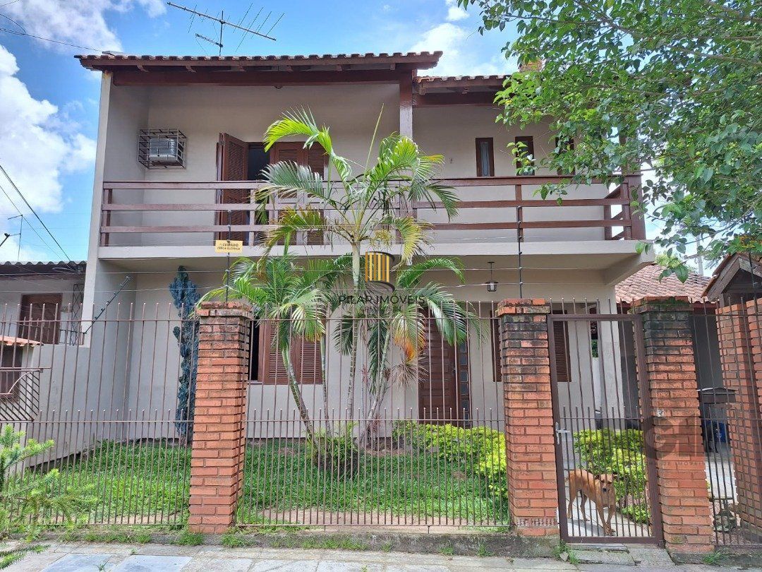 Casa 3 dormitórios no bairro Jardim Algarve - Pilar Imóveis