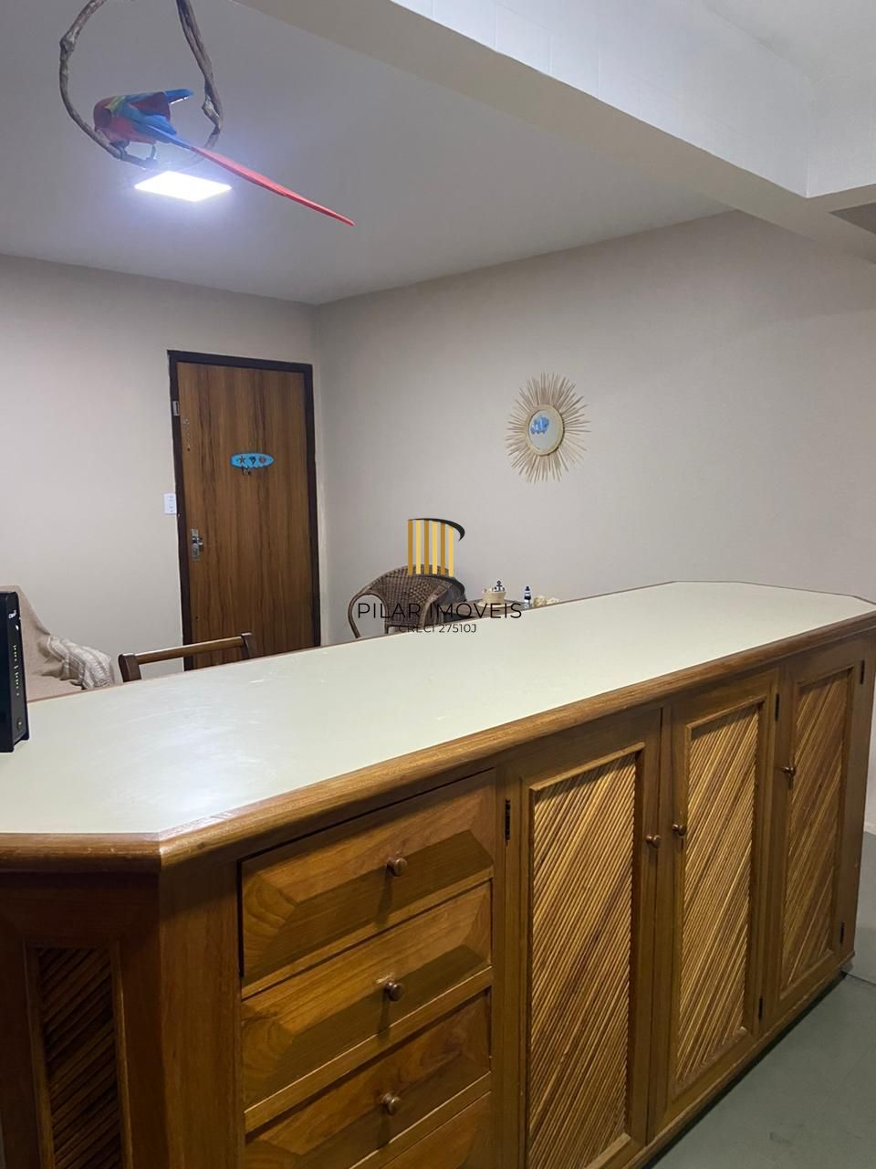 Apartamento com 2 dormitórios e garagem em Torres