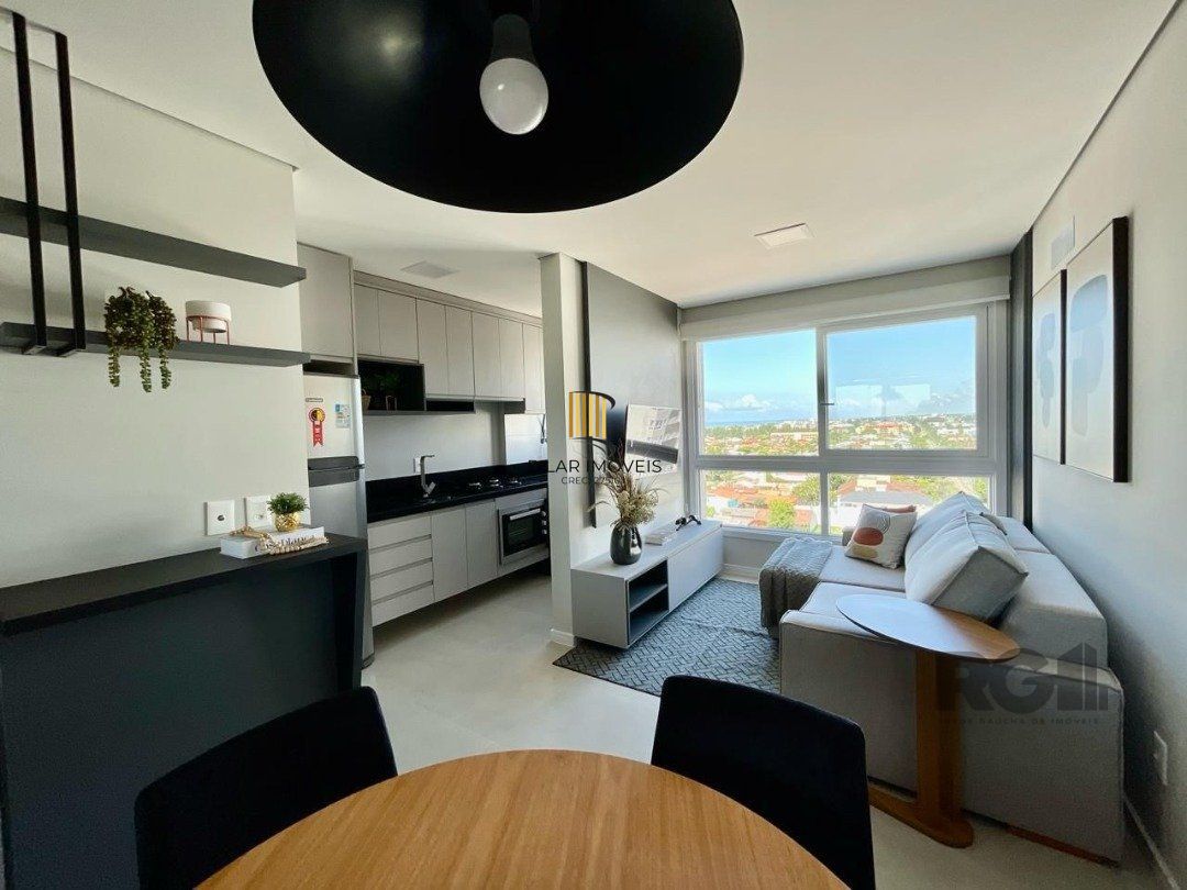 APARTAMENTO COM DOIS DORMITÓRIOS NO EDIFICIO DELPAINE EM CAPAO DA CANOA