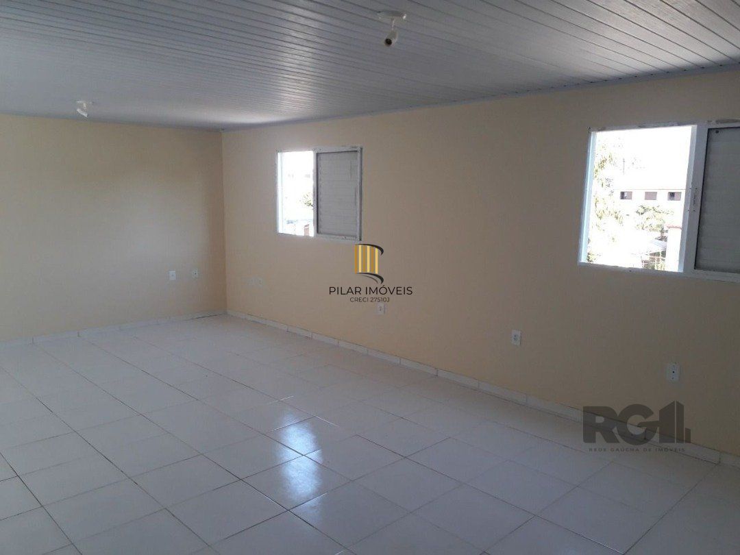 Oportunidade Imperdível: Prédio com 4 Apartamentos, Pátio e 2 Vagas de Garagem