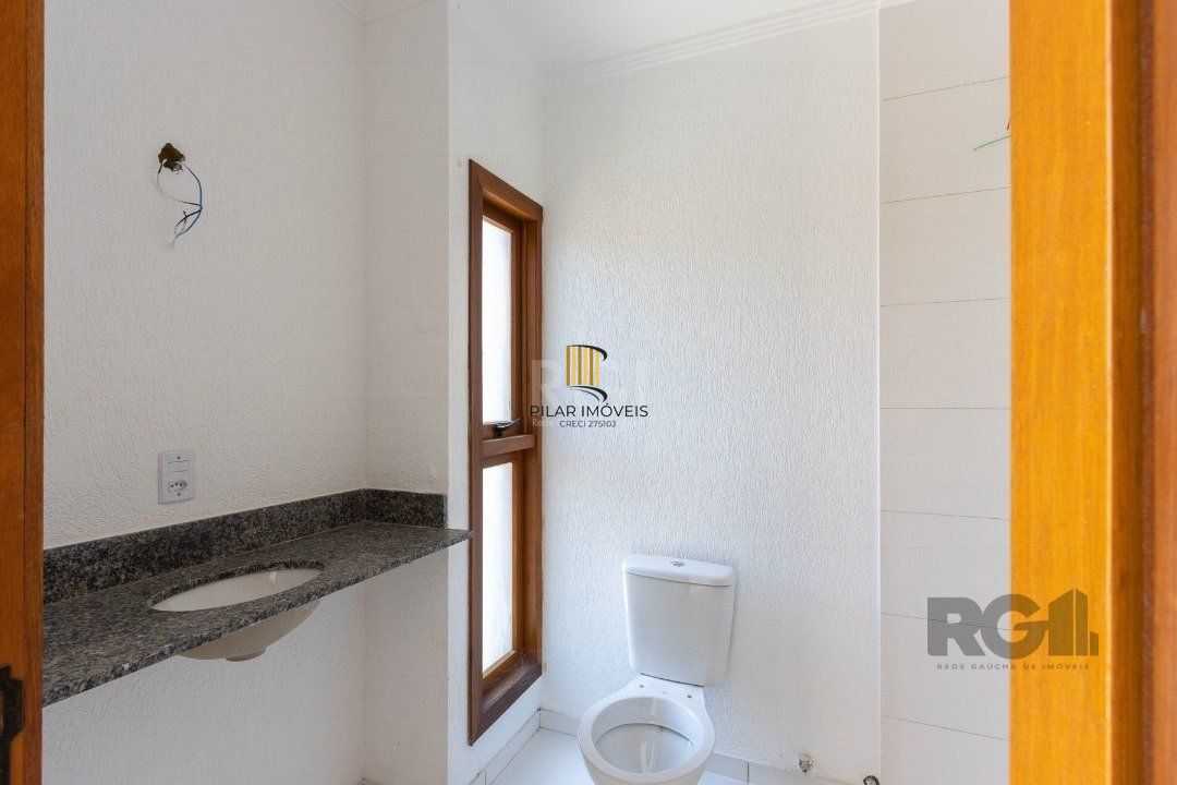 Casa 3 dormitórios no bairro Guarujá