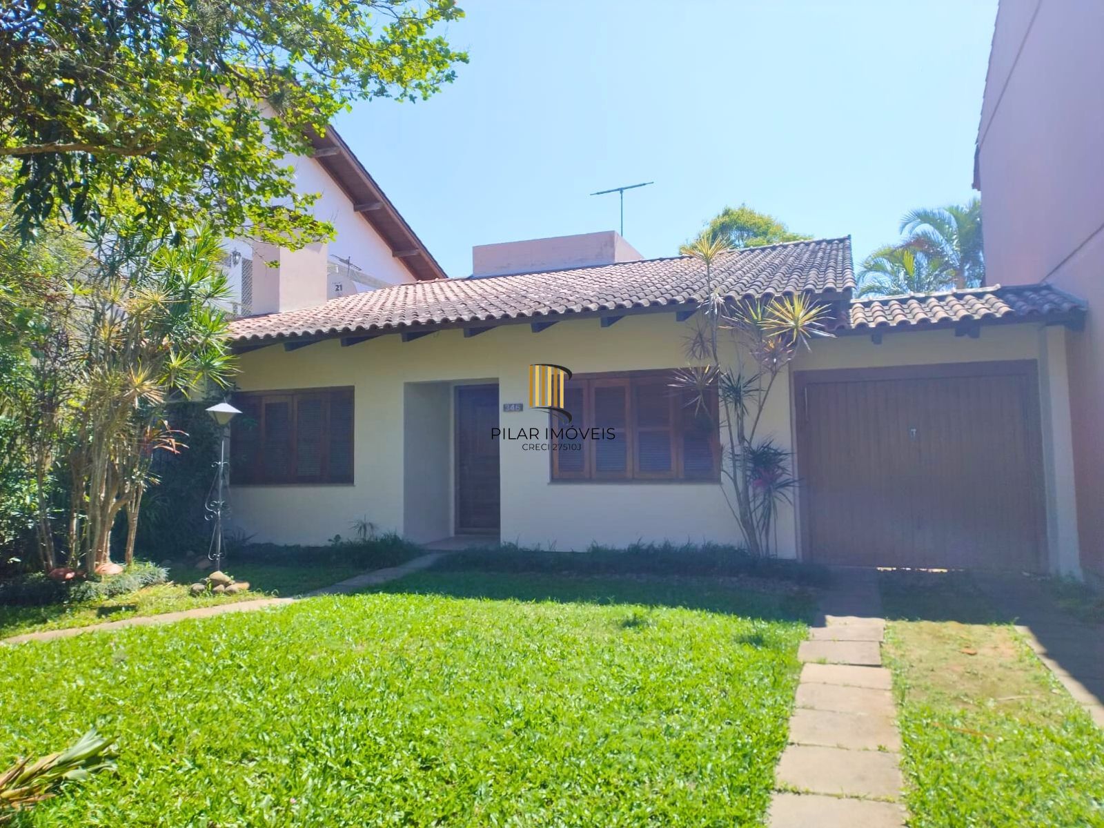 Viva em Ipanema, casa com lareira, churrasqueira e 3 dormitórios - Pilar Imóveis