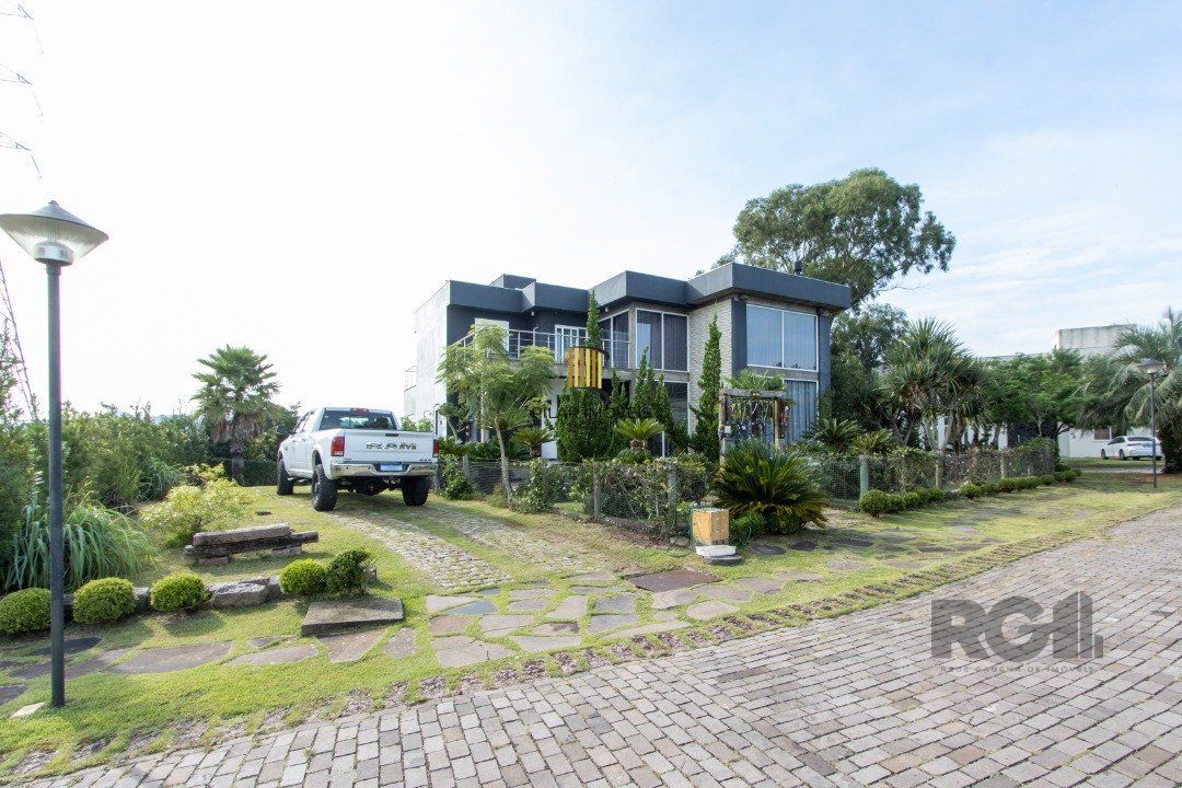 Casa de Condomínio 4 dormitórios no bairro Vila Nova - Pilar Imóveis