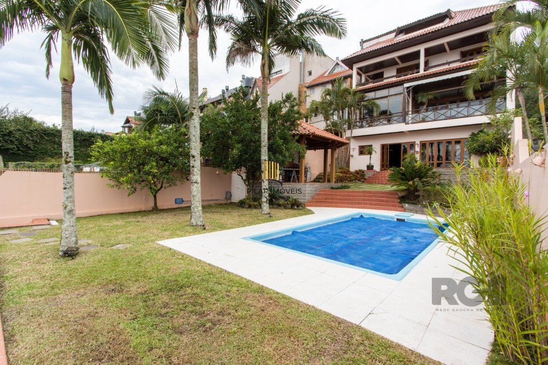 Casa para Venda com 4 dormitórios, sendo 2 suites e 4 vagas no bairro Jardim Isabel