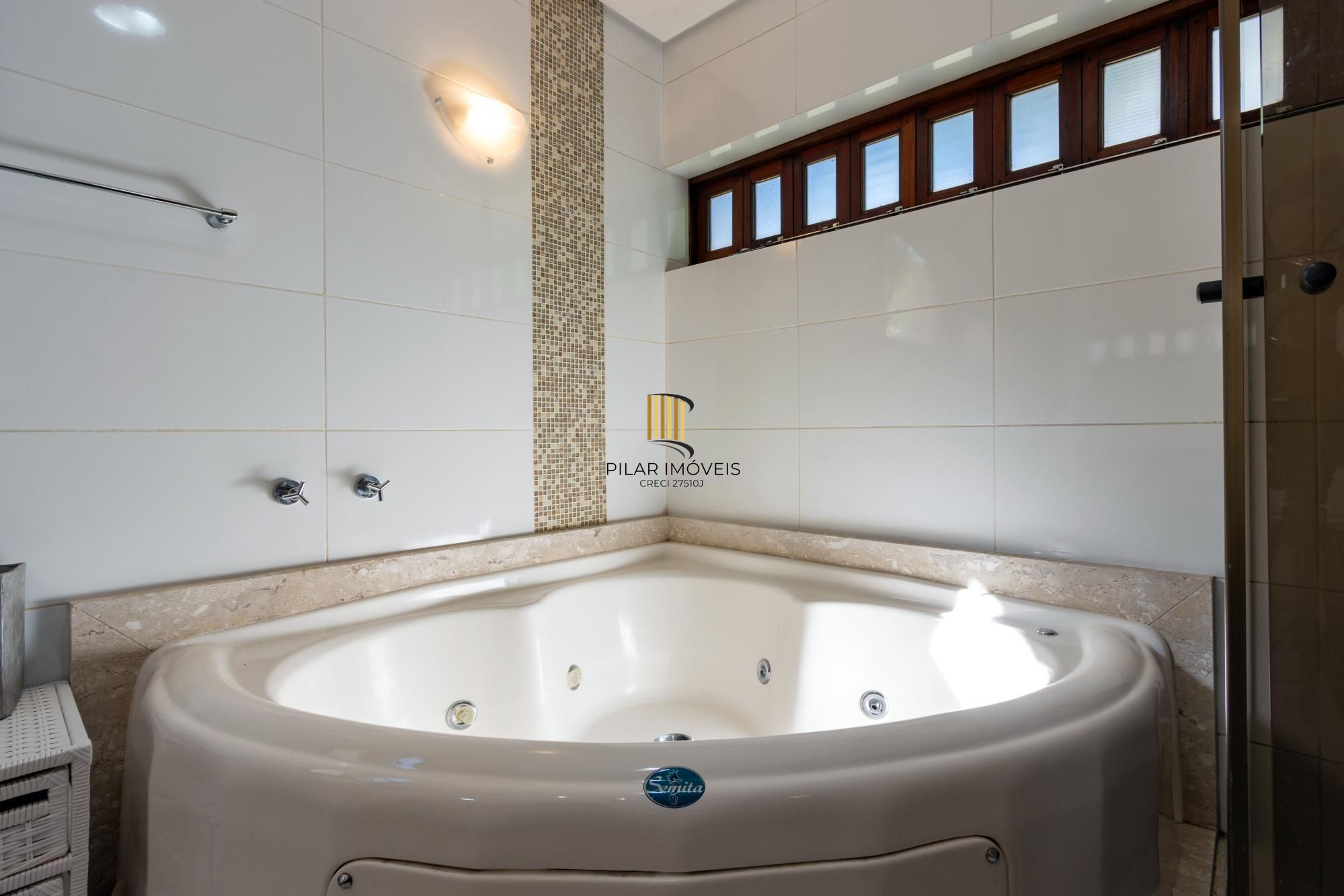 Casa de Condomínio 4 dormitórios no bairro Cavalhada