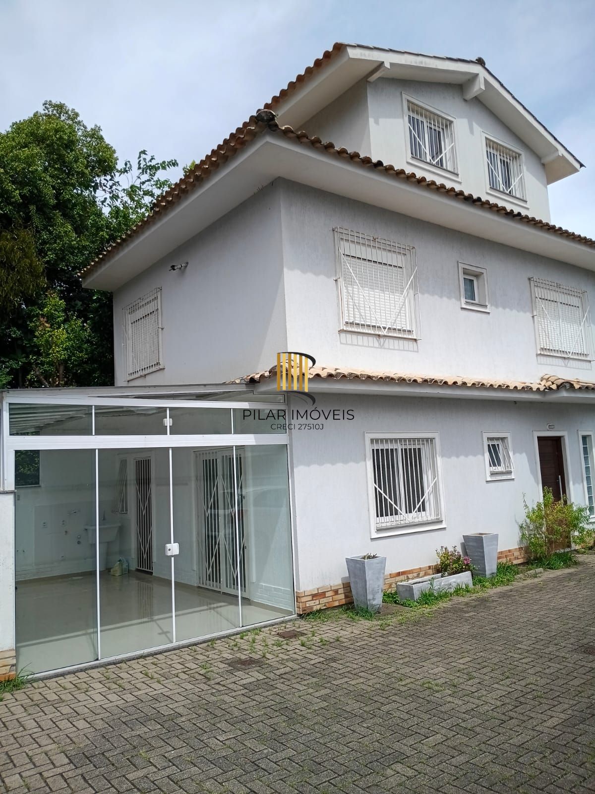 Casa de condomínio com 3 dormitórios no bairro Ipanema - Pilar Imóveis