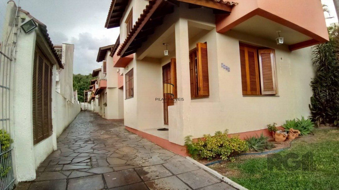 Casa de Condomínio 2 dormitórios no bairro Camaquã - Pilar Imóveis