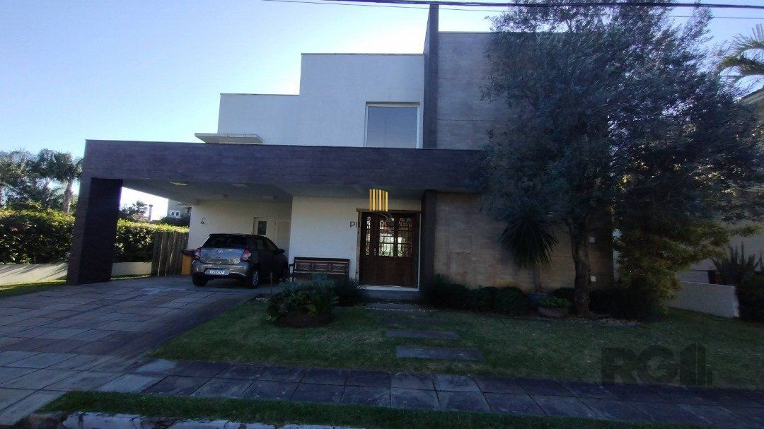 Casa de Condomínio 5 dormitórios no bairro Atlântida