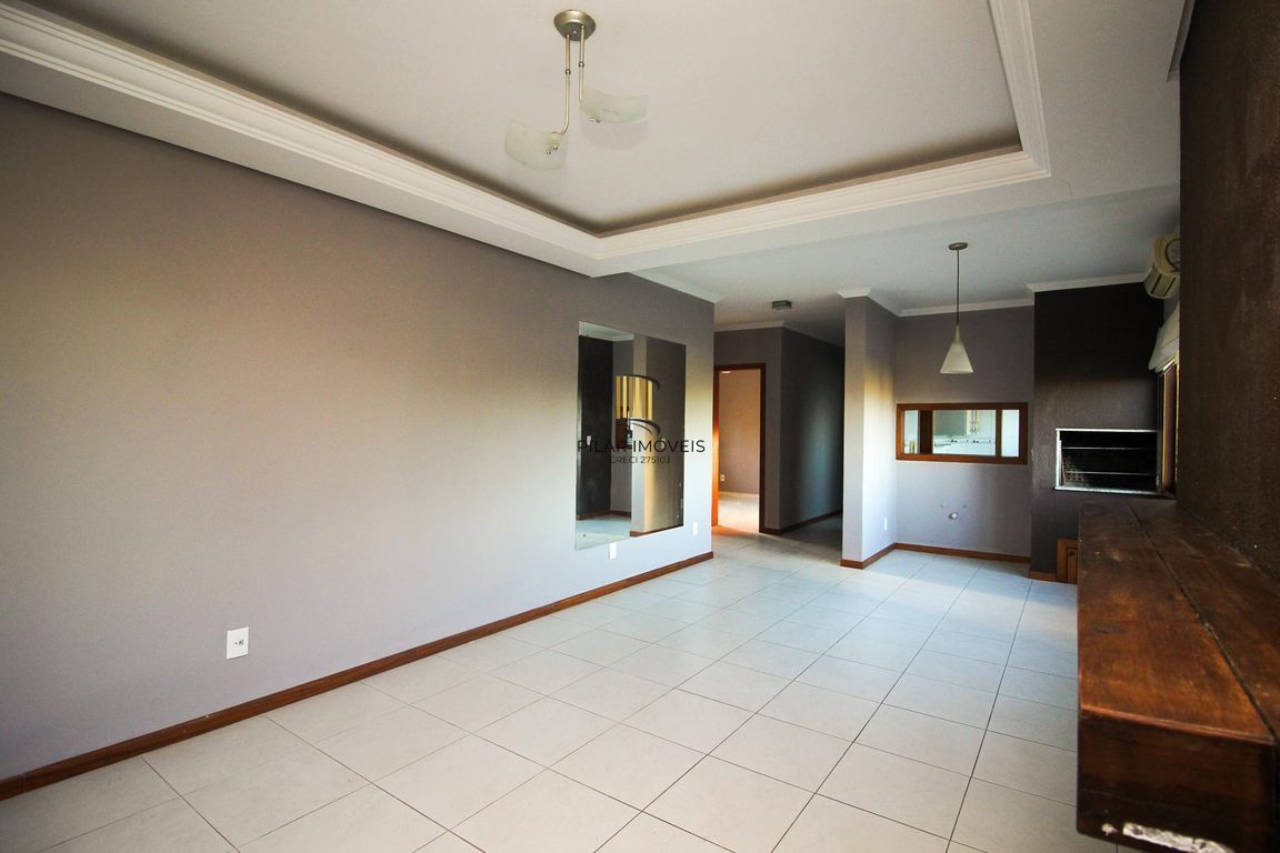 Apartamento de 2 dormitórios, 1 suíte, closet e 2 vagas de garagem .