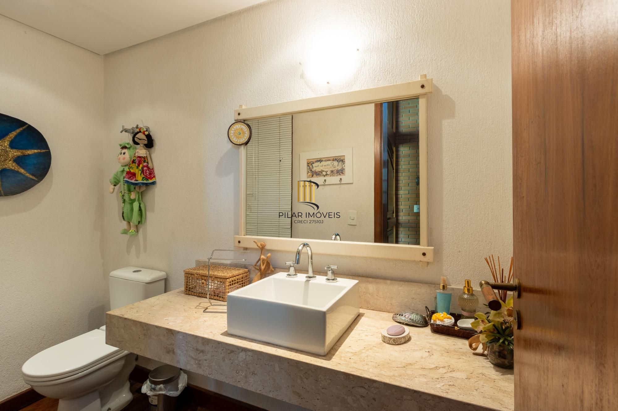 Casa de Condomínio 4 dormitórios no bairro Cavalhada