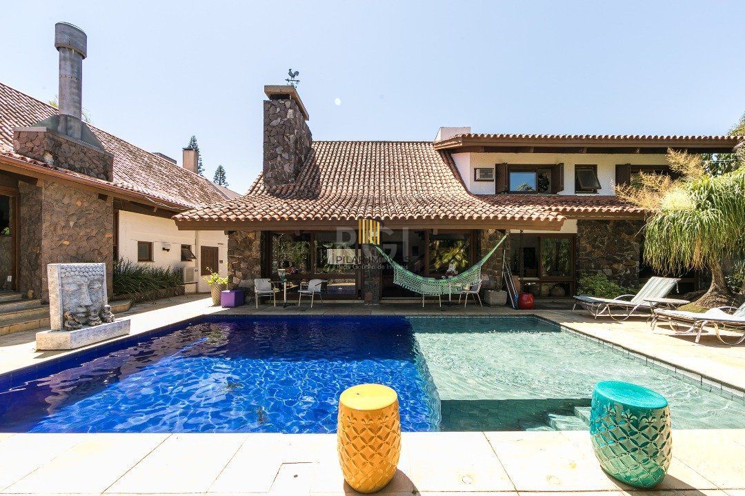 Casa para Venda - 370m², 5 dormitórios, sendo 2 suites, 7 vagas - Vila Assunção