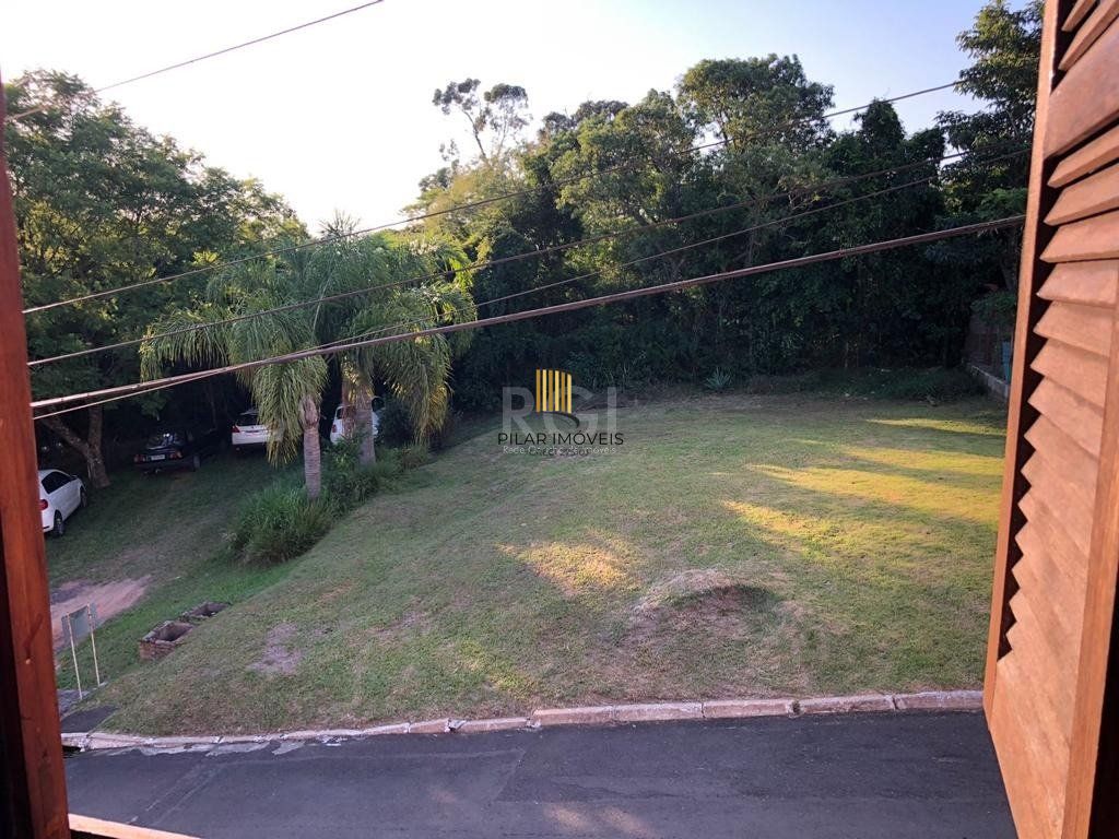 Casa de Condomínio 4 dormitórios no bairro Cavalhada