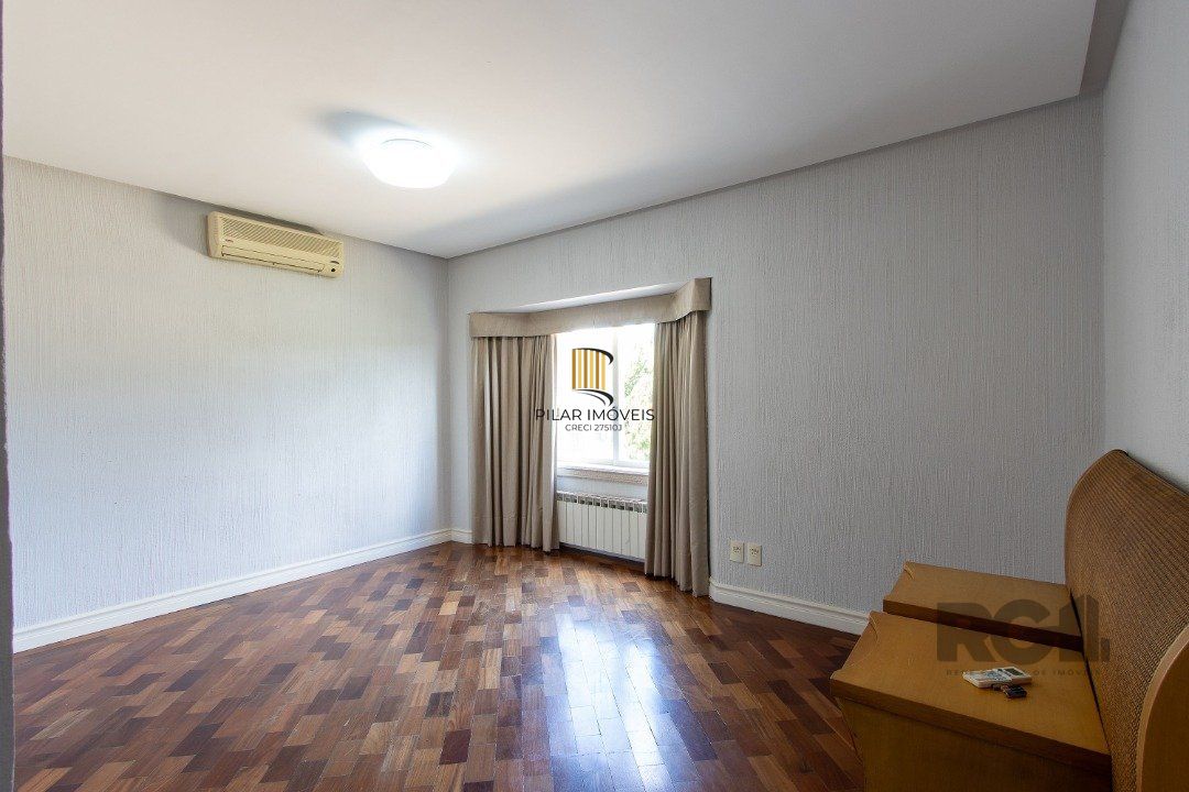 Casa de Condomínio 4 dormitórios no bairro Chapéu do Sol
