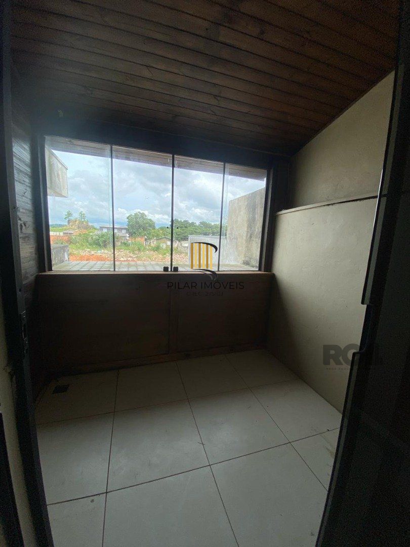 Casa 3 dormitórios no bairro Guarujá