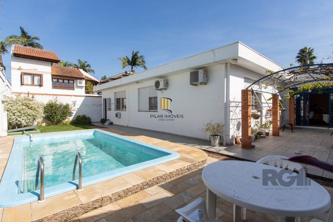 Casa 3 dormitórios no bairro Três Figueiras