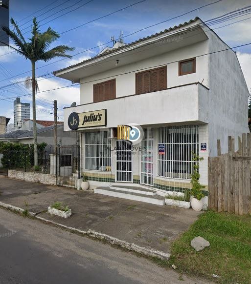 Apartamento de frente com 1 dormitório, sala, cozinha e sacada. - Pilar Imóveis