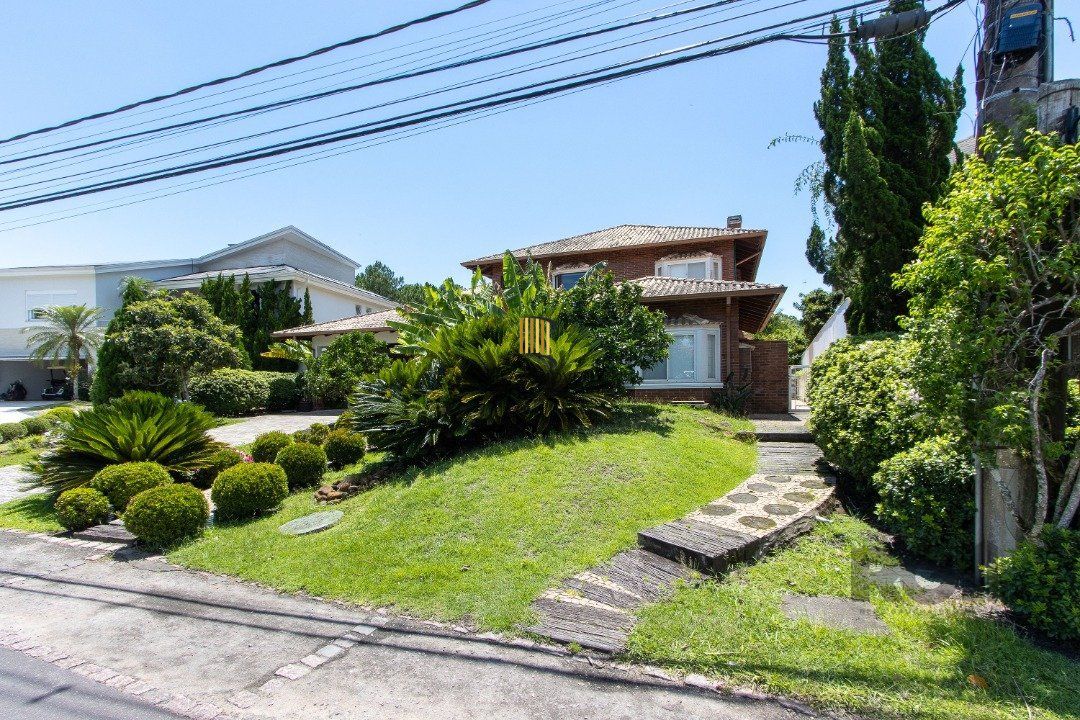 Casa de Condomínio 4 dormitórios no bairro Chapéu do Sol
