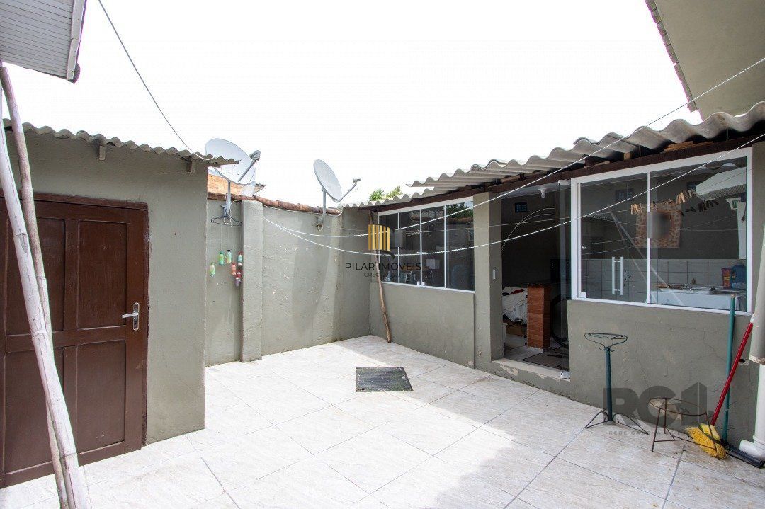 Casa térrea, 3 quartos, 2 banheiros, com pátio no Bairro Cavalhada
