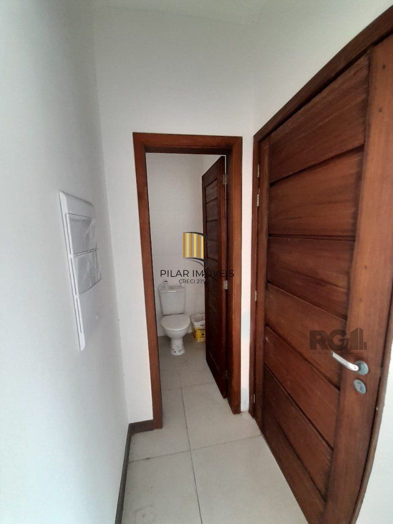 Casa 3 dormitórios no bairro Camaquã