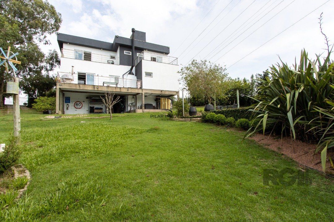 Casa de Condomínio 4 dormitórios no bairro Vila Nova
