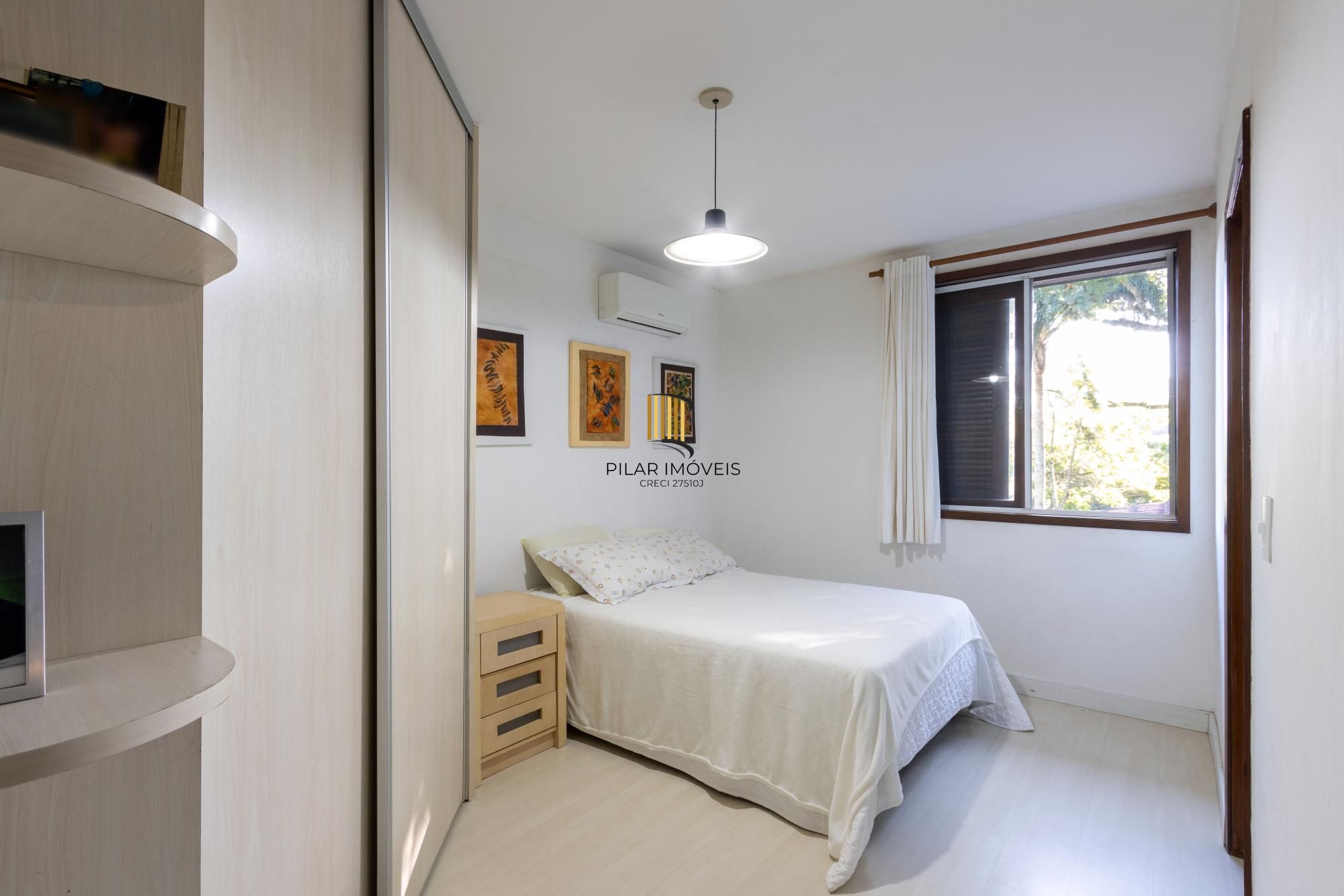 Casa de Condomínio 4 dormitórios no bairro Cavalhada